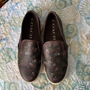 Coach logo with floral print slip on shoes